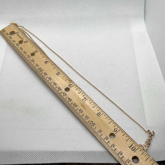 Believe Gold Tone Spell Out Necklace - Picture 5 of 6